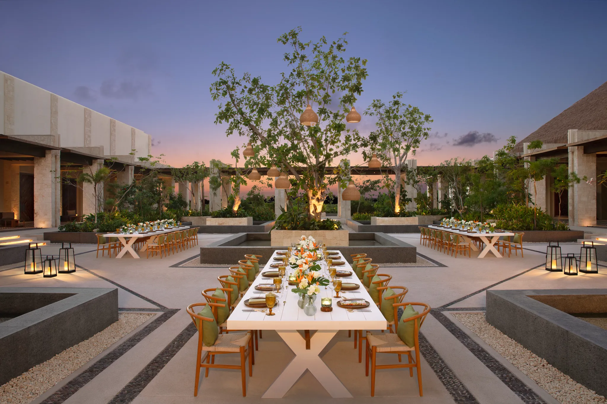 Courtyard Plaza reception setup with garden décor at Secrets Playa Blanca Costa Mujeres