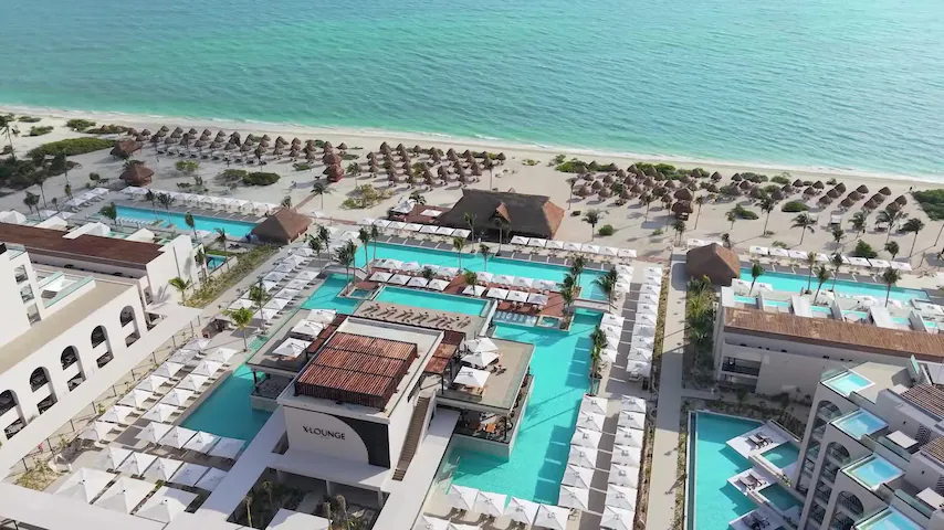 Excellence Playa Mujeres adults-only all-inclusive resort with beachfront suites and lagoon-style pools in Mexico.