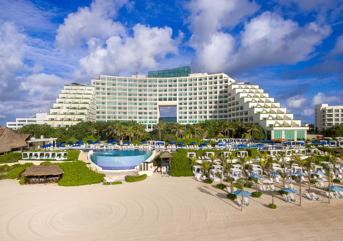 Live Aqua Beach Resort Cancun adults-only all-inclusive in the Hotel Zone with beachfront pools, modern design, and vibrant nightlife access.
