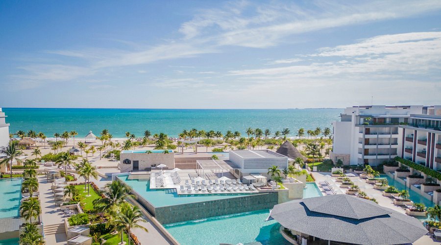 Majestic Elegance Costa Mujeres luxury all-inclusive resort with expansive pools, beachfront setting, and family-friendly amenities near Cancun.