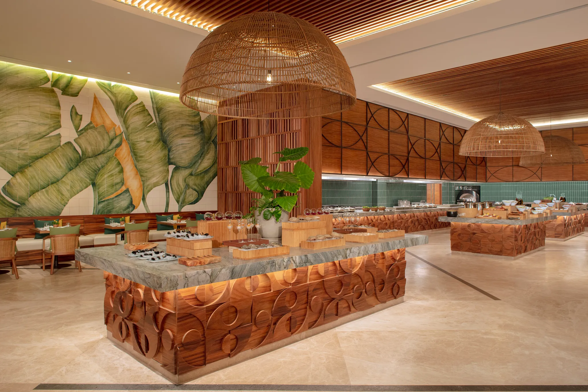 Market Café buffet at Secrets Playa Blanca Costa Mujeres featuring diverse international dishes, open kitchen stations, and bright casual dining space.