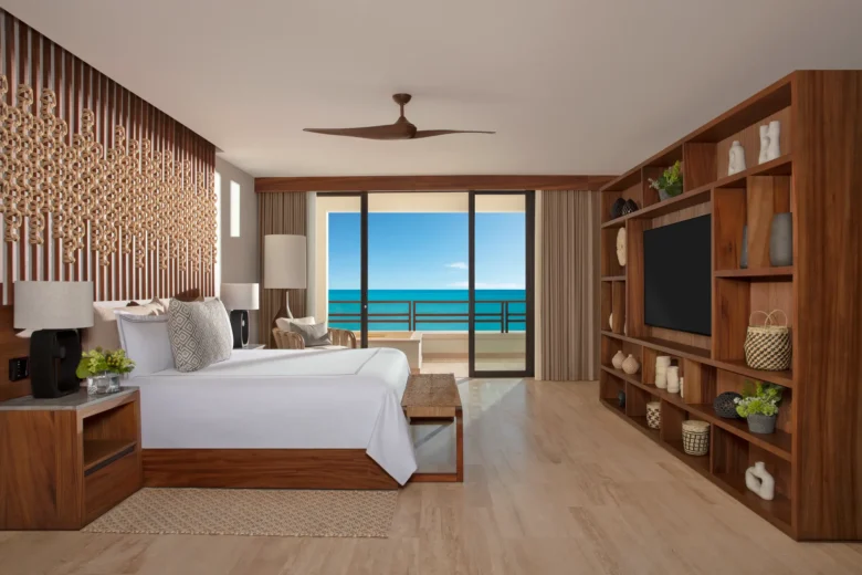 Preferred Club Master Suite Ocean Front bedroom with king bed and balcony ocean view at Secrets Playa Blanca Costa Mujeres.