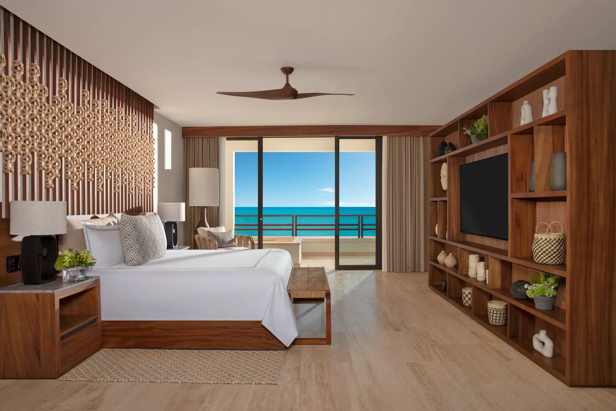 Preferred Club Master Suite Ocean Front bedroom with king bed and balcony ocean view at Secrets Playa Blanca Costa Mujeres.