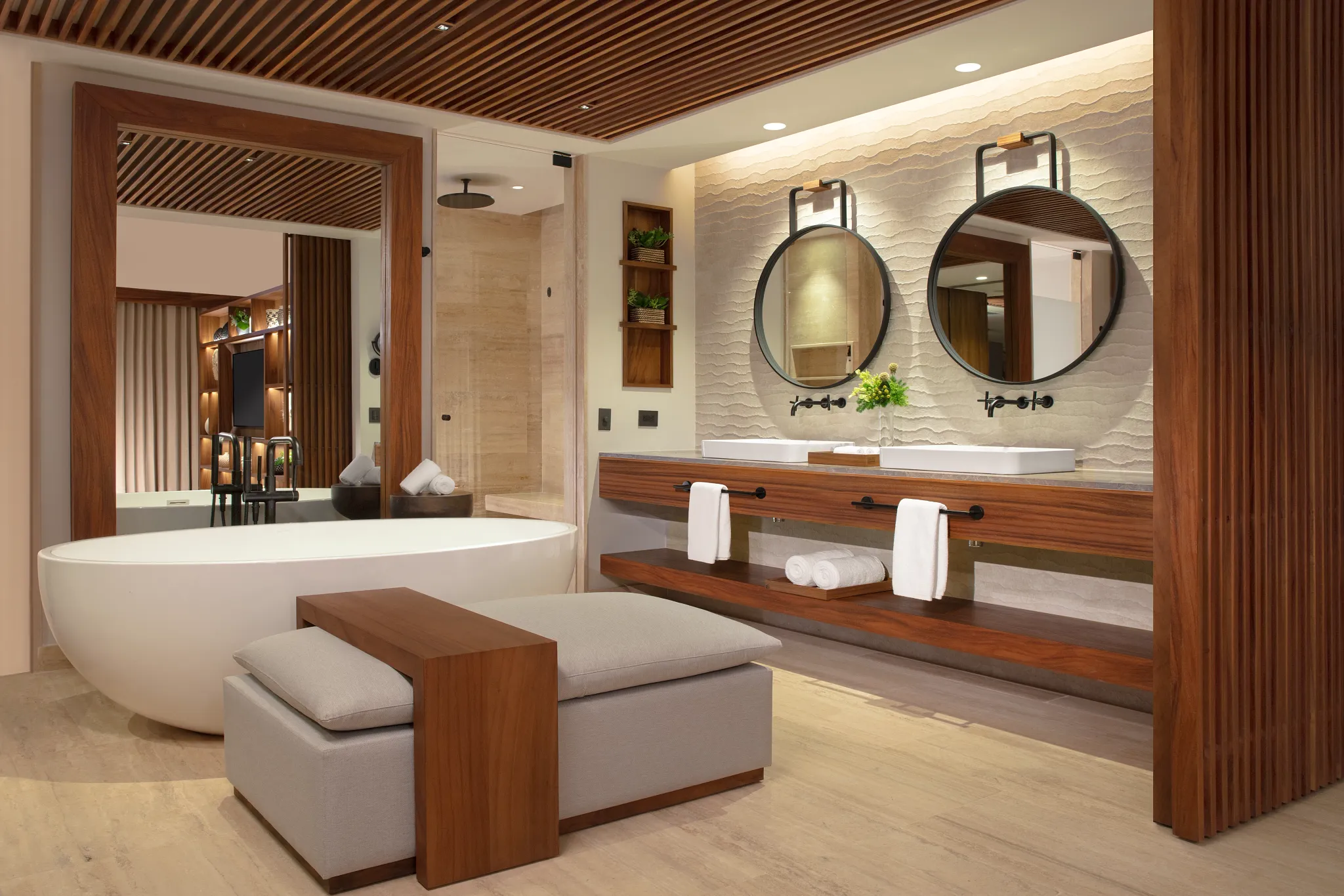 Luxury bathroom with freestanding tub and double vanity in Preferred Club Master Suite Swim Out Ocean Front.