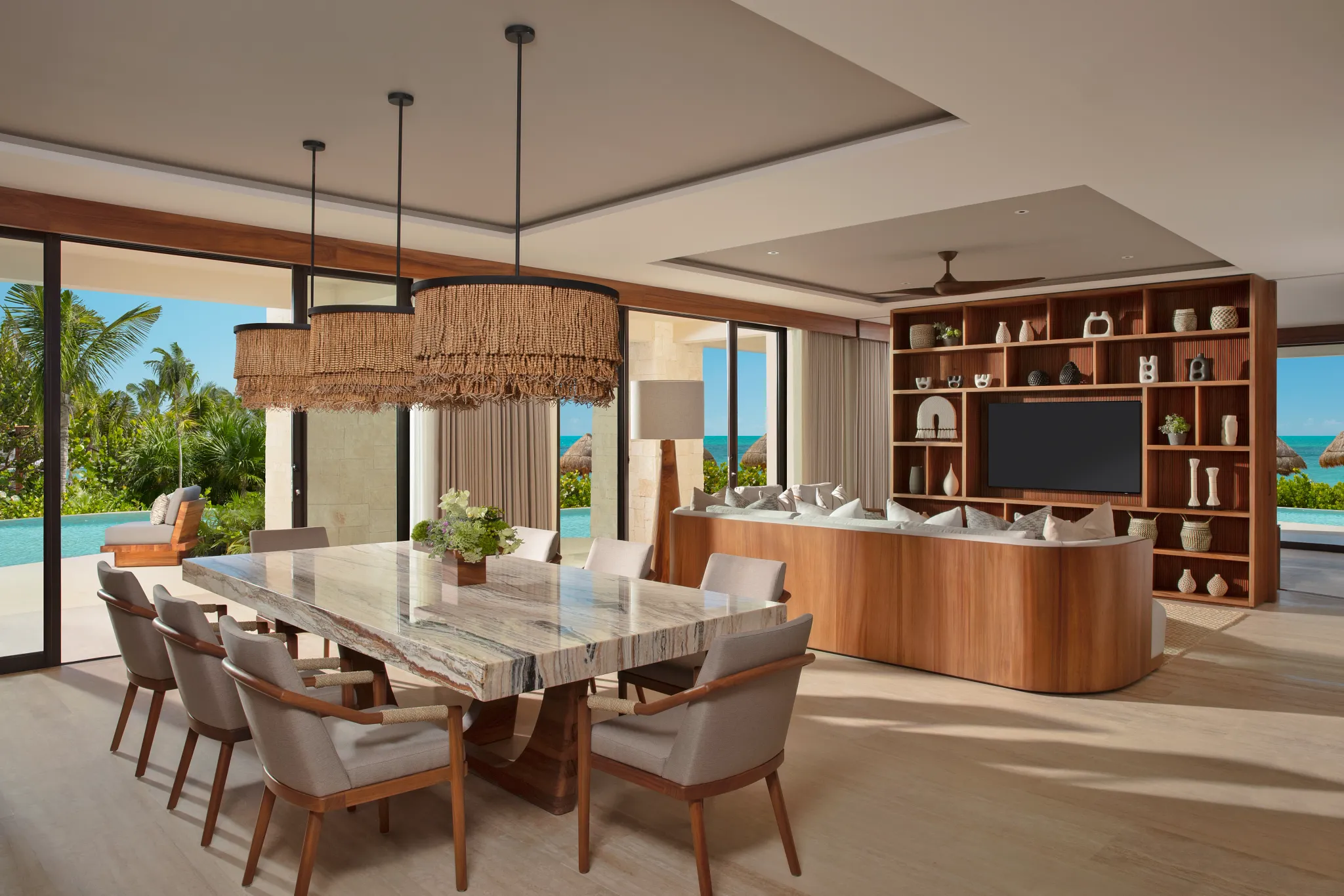 Presidential Suite living room with sofa and ocean views at Secrets Playa Blanca Costa Mujeres.