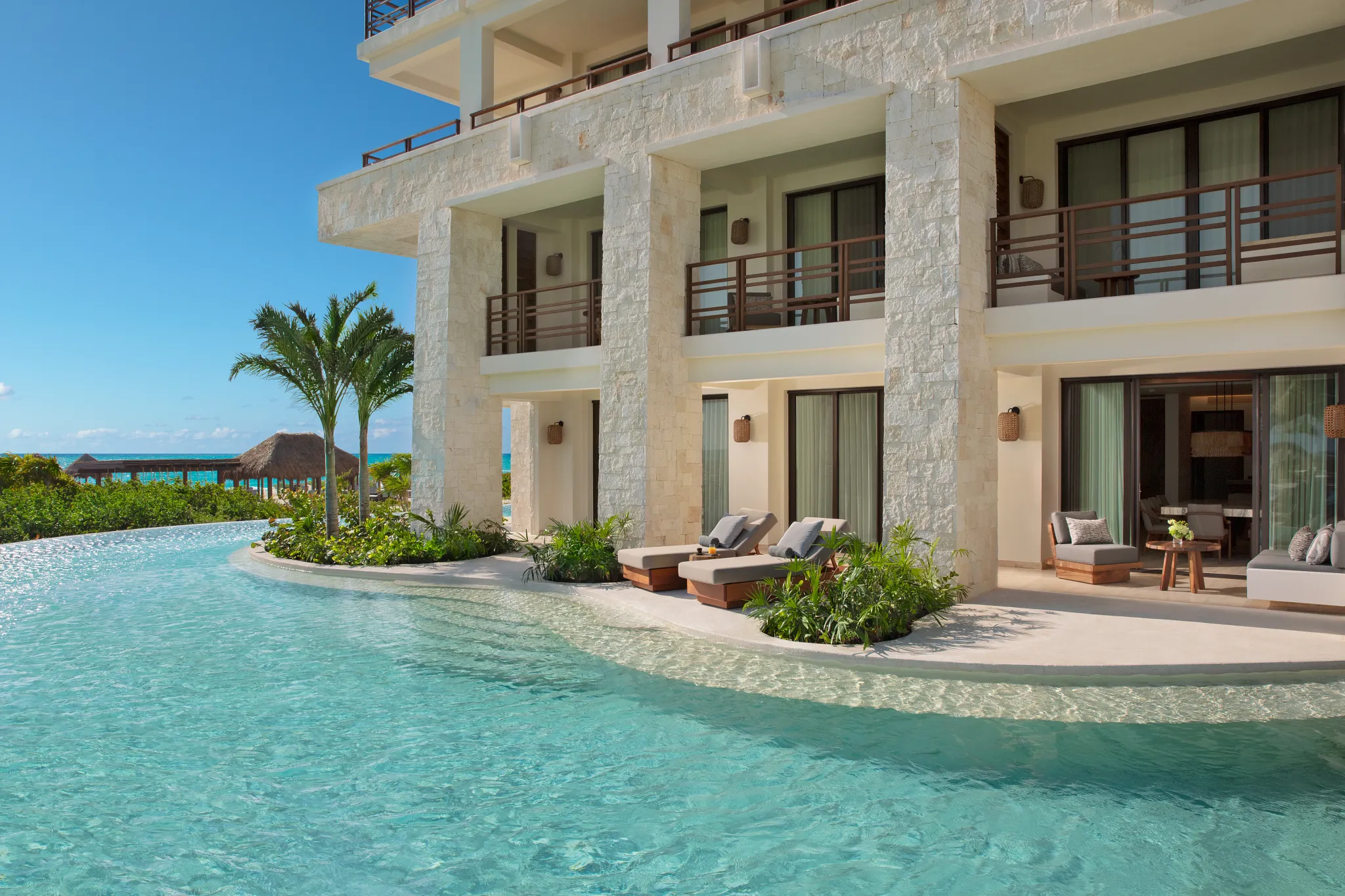 Presidential Suite swim-out terrace with private pool and ocean views at Secrets Playa Blanca Costa Mujeres.