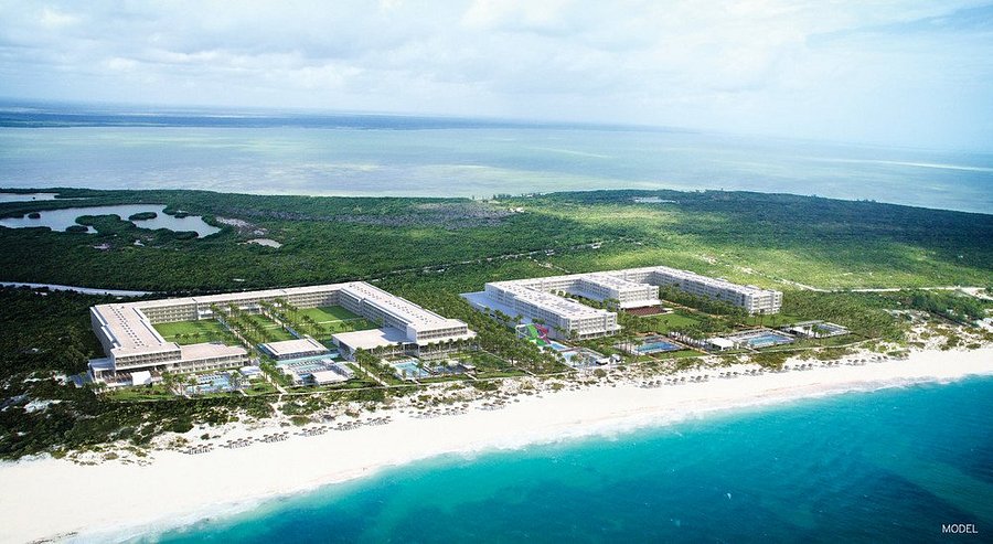 Riu Palace Costa Mujeres all-inclusive resort with beachfront pools, grand architecture, and family-friendly amenities in Costa Mujeres.